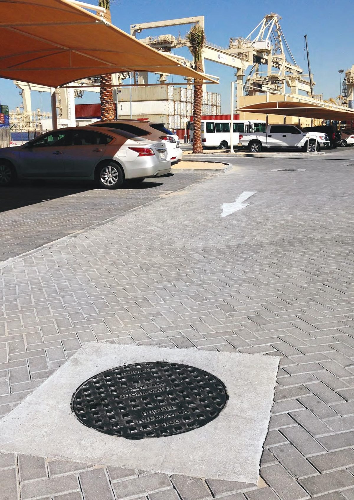 Circular solid top cover installed at a port