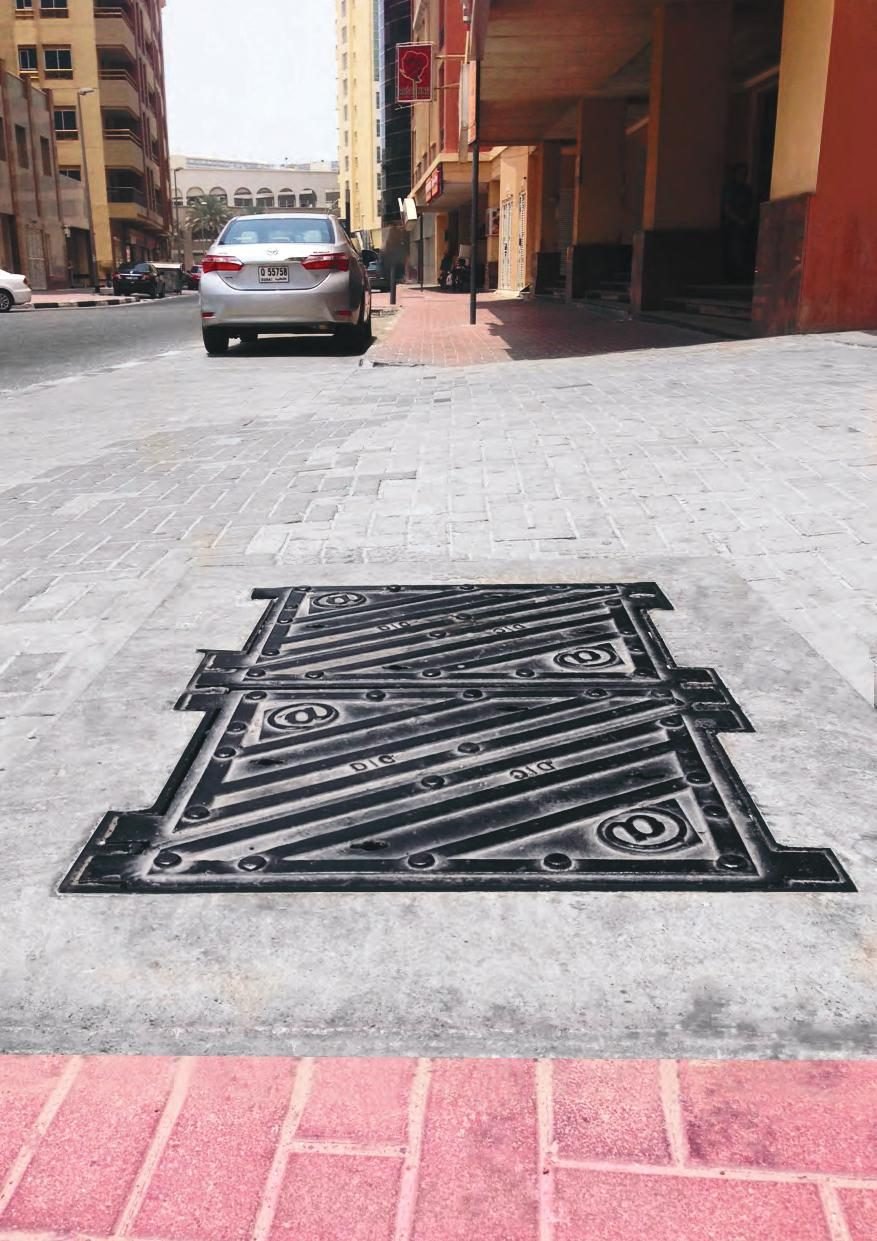 Multi-leaf telecom cable chamber cover in a street